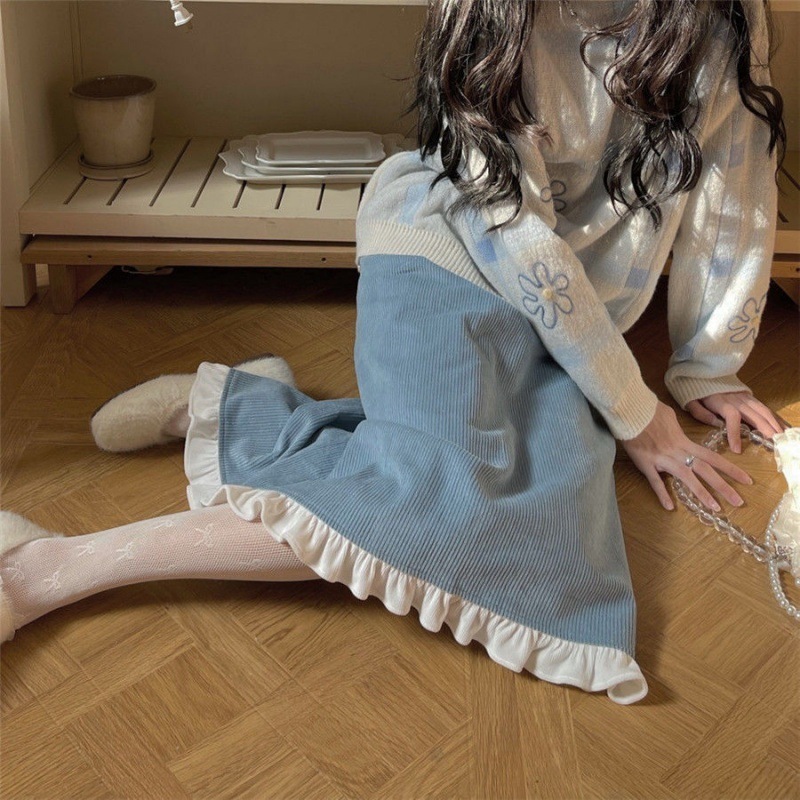 bfd86e1c-75fe-4425-8c72-c28c6ece97a0.jpg A Woman Wearing A Sweater With A Base Top - Image 6