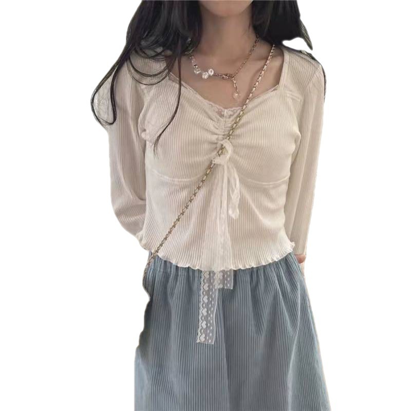 c7b45d92-becb-4de6-ae32-171537481d71.jpg A Woman Wearing A Sweater With A Base Top - Image 5